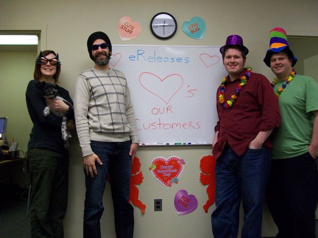 Valentine's Day From left to right: Heather Fuller (holding Sammy, the clown-faced dog), Andrew Crisp, Gary Thompson, and Mickie Kennedy